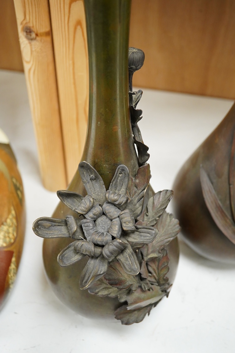 A pair of Japanese Meiji bronze floral vases, 36.5cm high